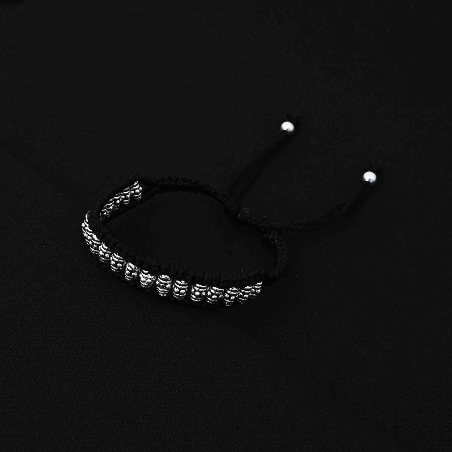 Trendy silver bracelet for boys adorned with smooth oval-shaped silver beads