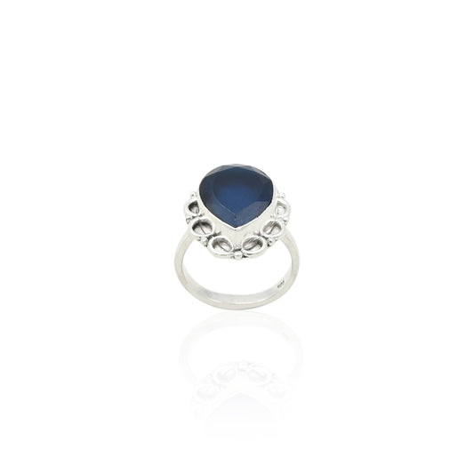 Elegant silver ring adorned with a radiant midnight blue gemstone, perfect for evening wear