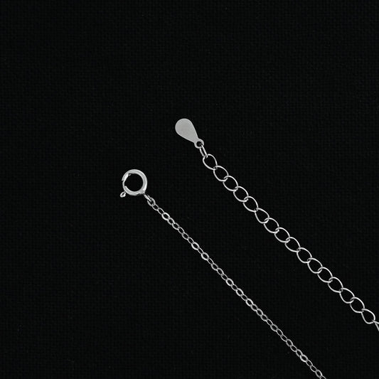 Silver chain with a custom 'H' symbol pendant design.