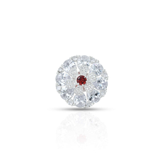 Delicate silver ring for girls showcasing a round red stone set in a floral motif.