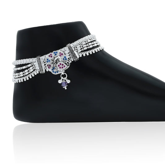 Elegant silver anklet featuring colorful gem-studded floral designs.