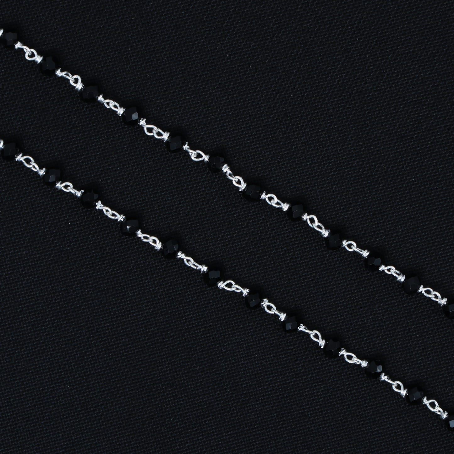 Exquisite silver payal with black beads, ideal for girls who appreciate understated elegance and timeless style.