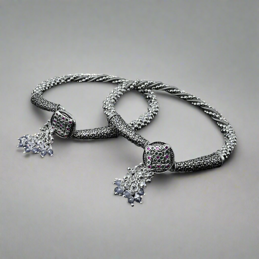 Elegant silver anklet in kada style featuring floral designs