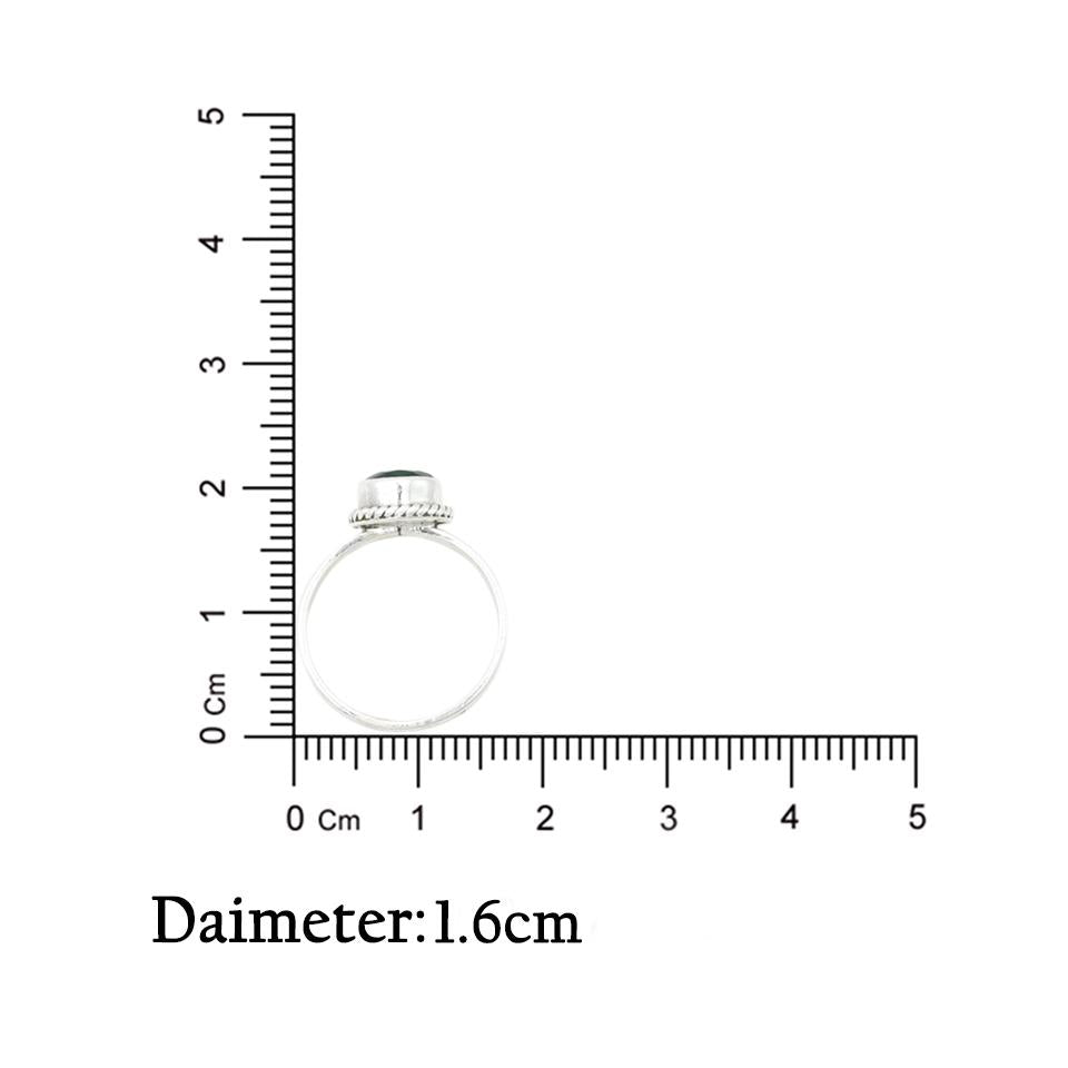 Elegant silver ring with a polished green round gemstone, creating a timeless and graceful accessory