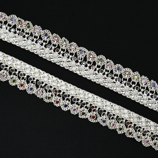 Silver bridal anklet with intricate colorful beads for a bold and beautiful style