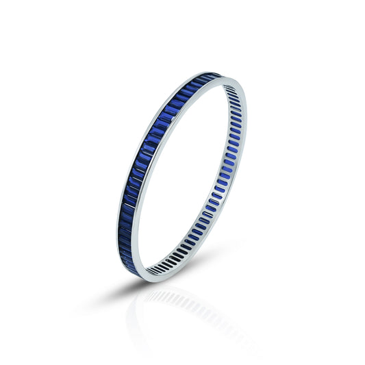 Elegant silver bangles featuring stunning royal blue stone accents