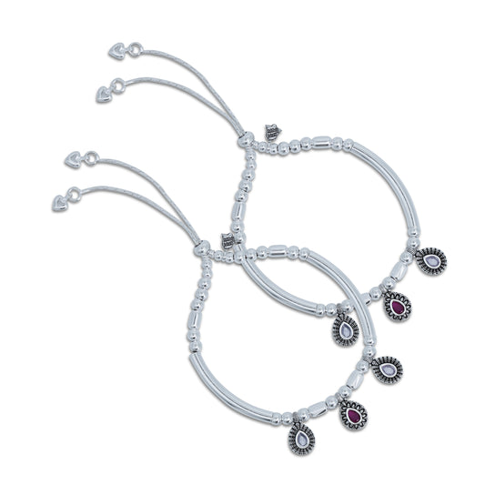 Elegant silver anklet embellished with purple and white gemstone accents