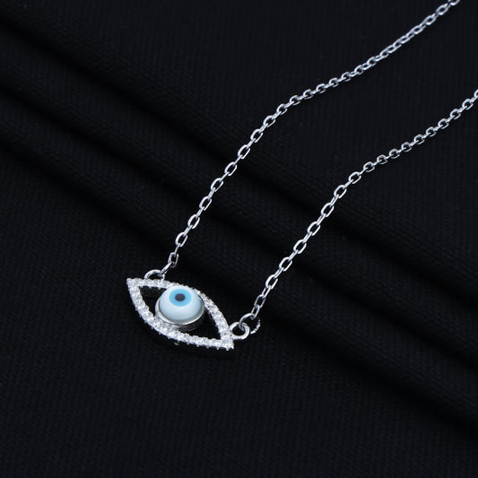 Delicate thin chain pendant in sterling silver with an evil eye motif