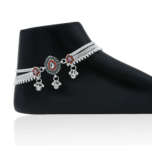 Elegant silver anklets adorned with flowers and gemstones