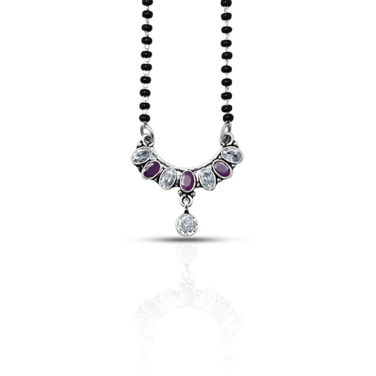 Elegant sterling silver mangalsutra with a delicate bow and a stunning purple gemstone
