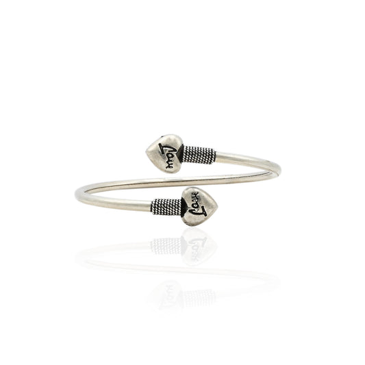 Silver girls' kada featuring a symbolized lovely heart design