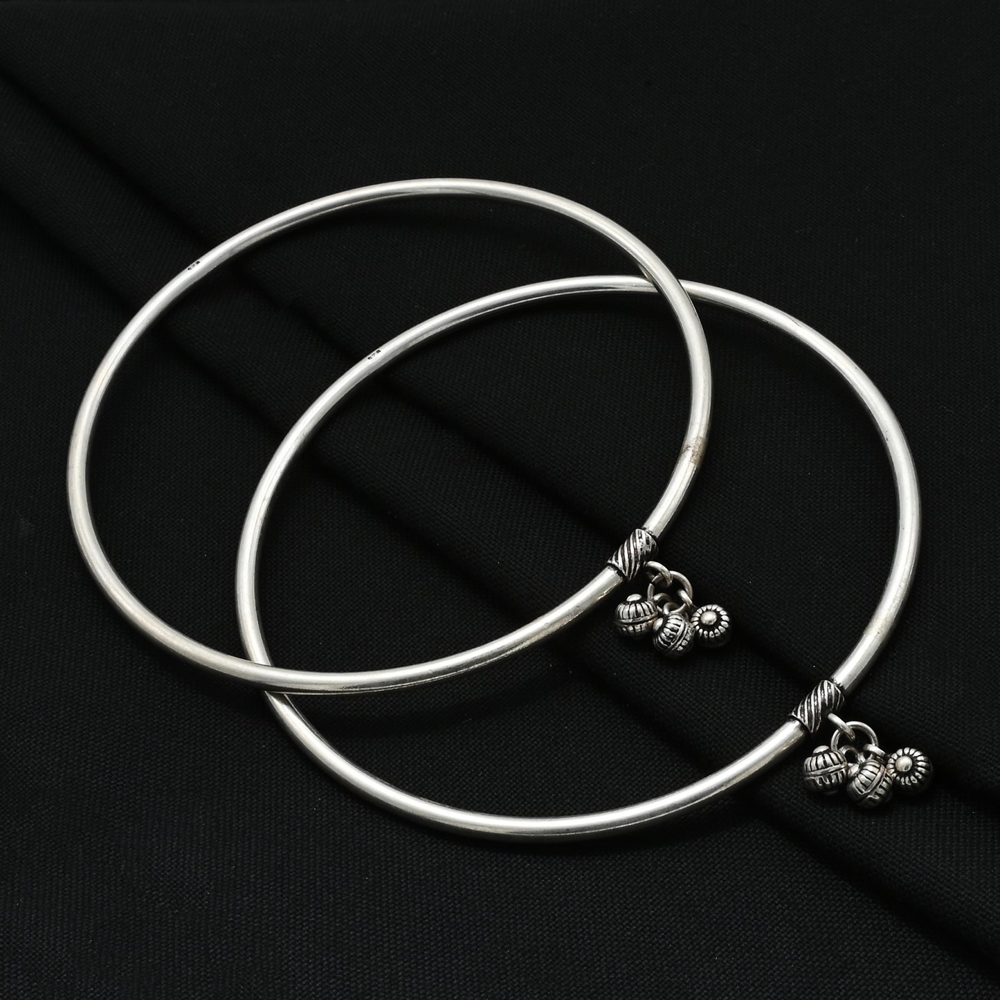 Charming silver traditional kada payal with detailed charms for a refined, classic style