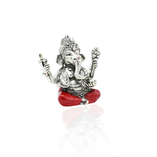 Handcrafted silver Lord Ganesha idol in a blessing pose, symbolizing wisdom, protection, and positive energy.