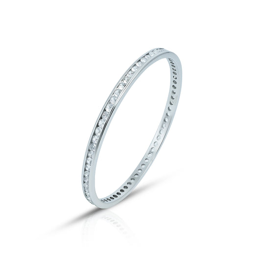 Elegant silver bangles featuring intricate designs and white stones