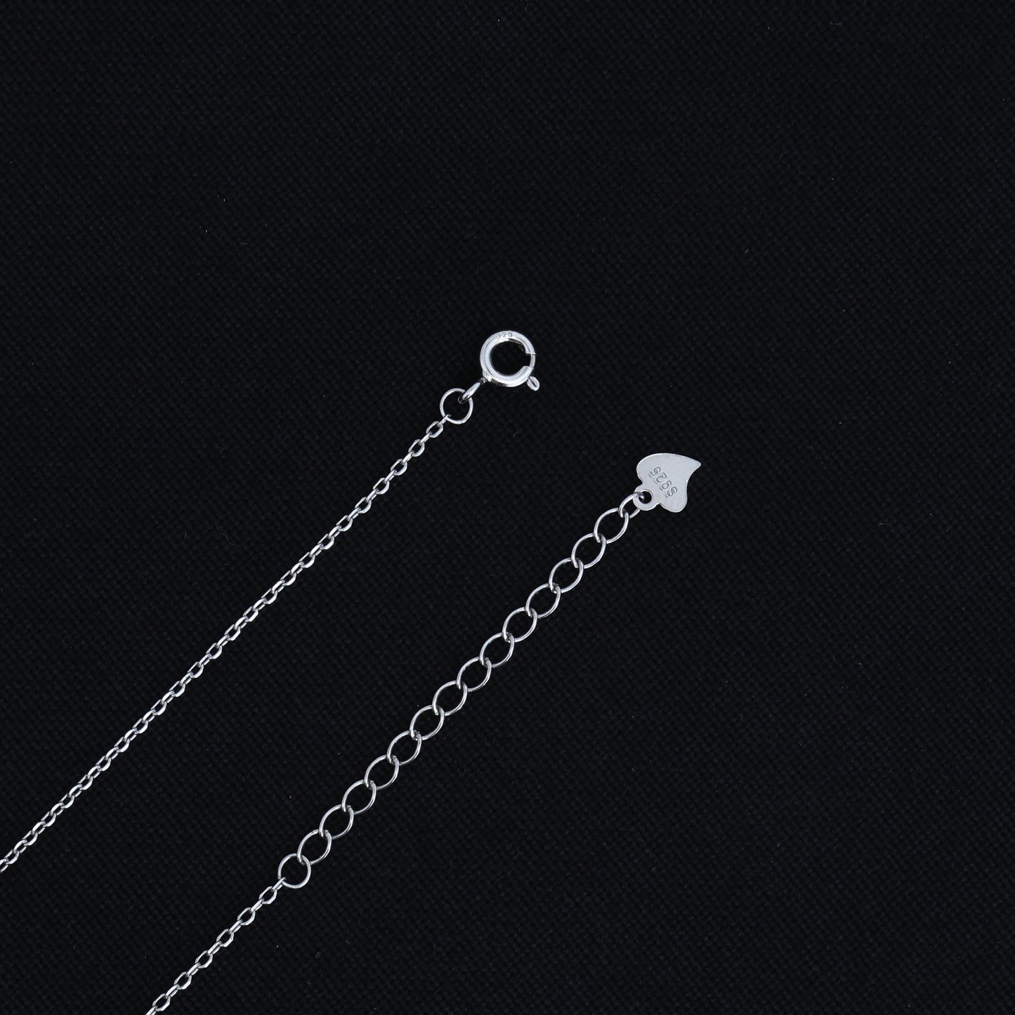 Elegant silver chain pendant with a modern curve