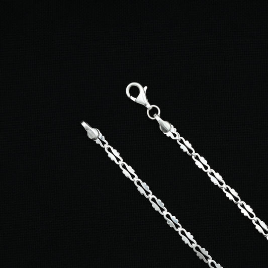 Stylish men's sterling silver chain with sleek pendant.