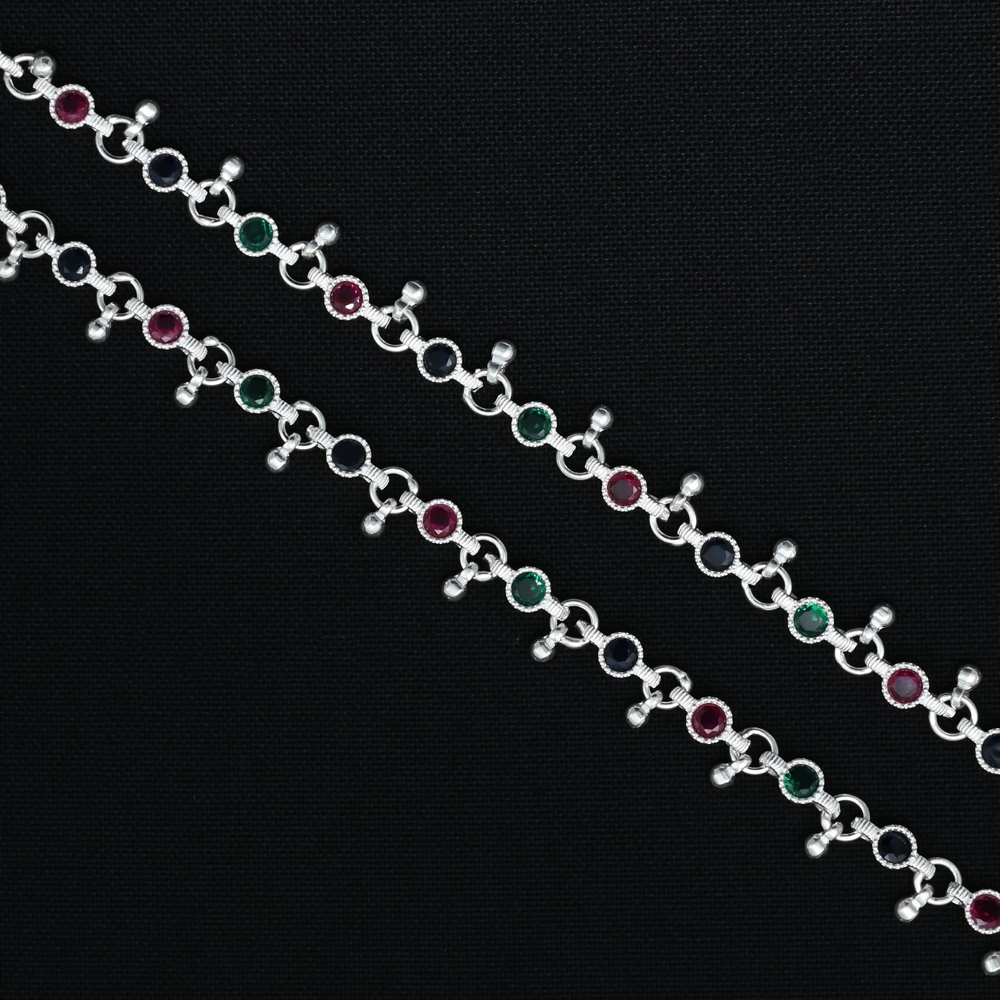 Beautiful silver payal with multicolour stones, designed for women seeking a bold and fashionable accessory