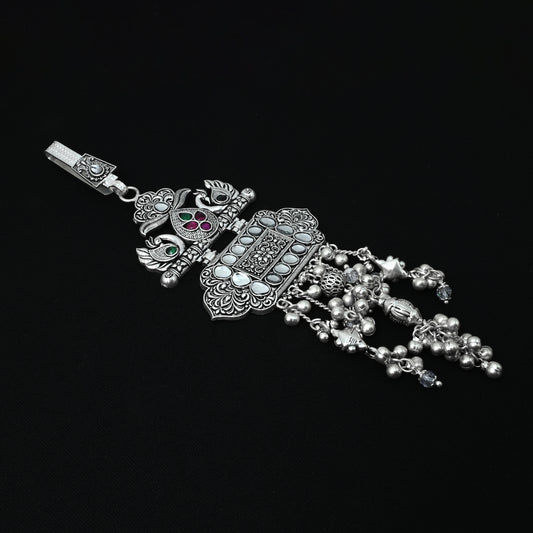 Vintage-Inspired Silver Keychain with Traditional Artwork Design