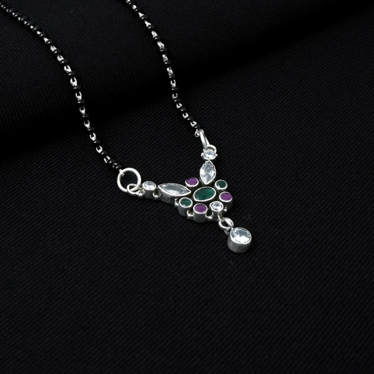 Modern Silver Mangalsutra Featuring Pendant with Array of Shaped Stones.