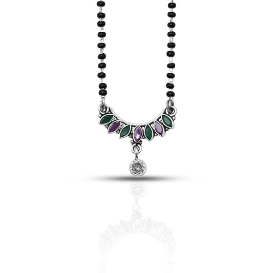Elegant sterling silver mangalsutra with round green and purple gemstones in a leaf pattern