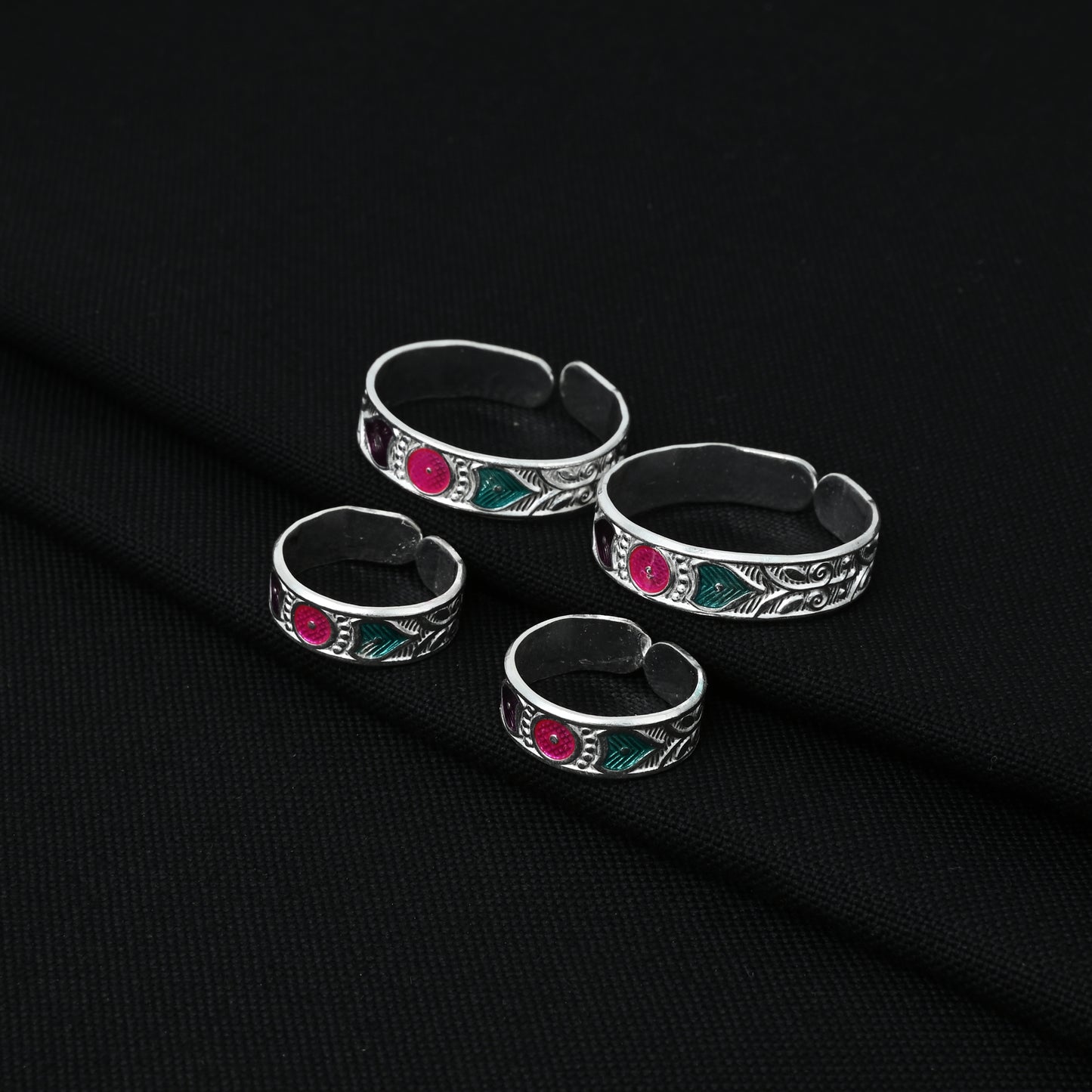 Handcrafted silver toe rings with a striking sharp and colorful design, perfect for a fashionable appearance