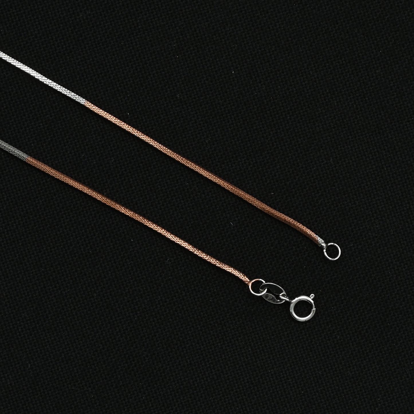 Radiant silver chain with rose gold highlights for a modern touch