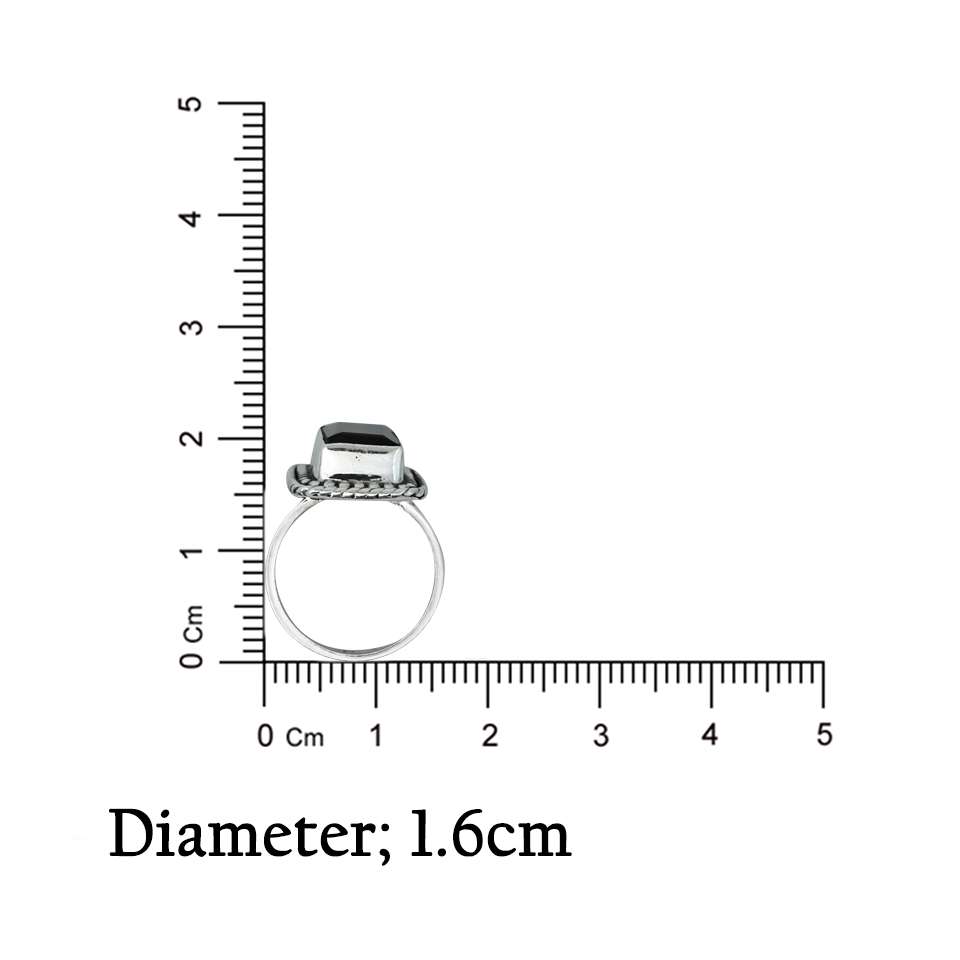 Beautiful silver ring with rectangular red gemstone accent.