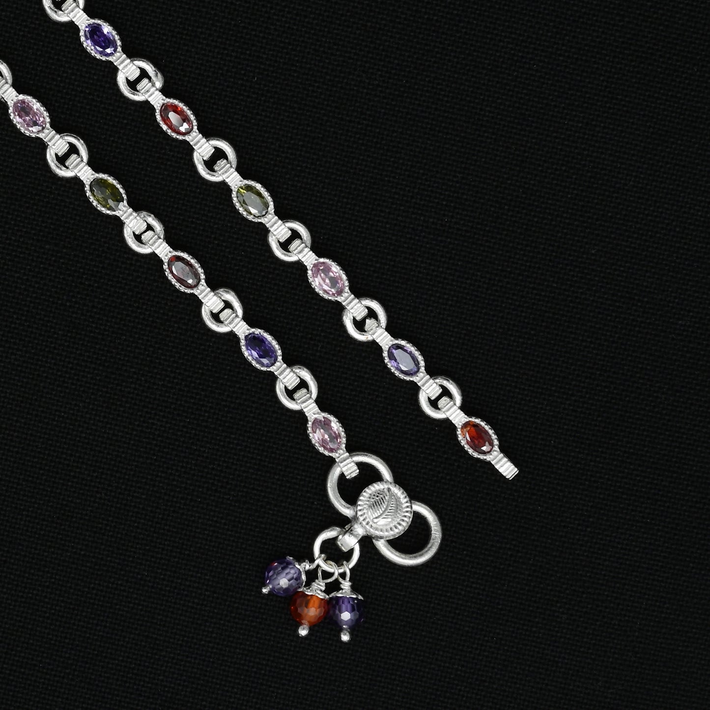 Silver anklet for girls with light purple oval-shaped gemstones and silver bead detailing
