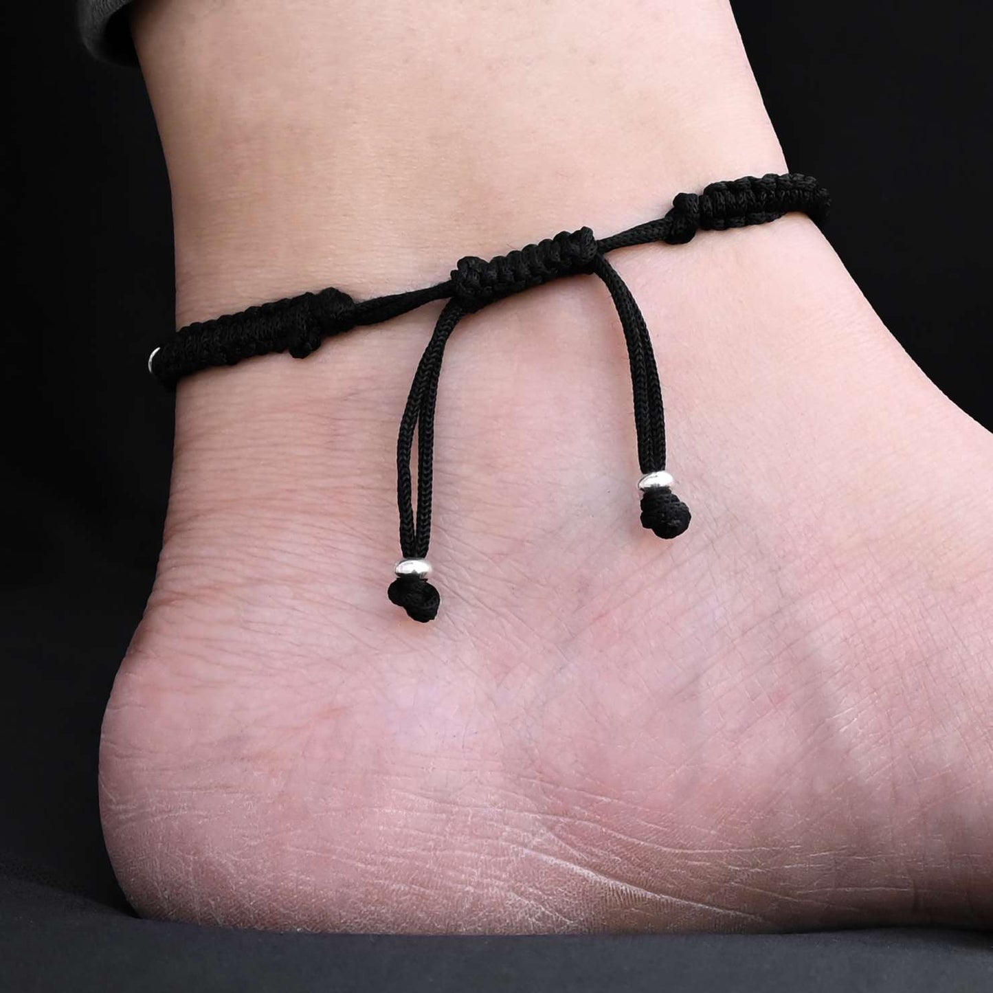 Charming butterfly design dhaga payal adorned with silver beads.