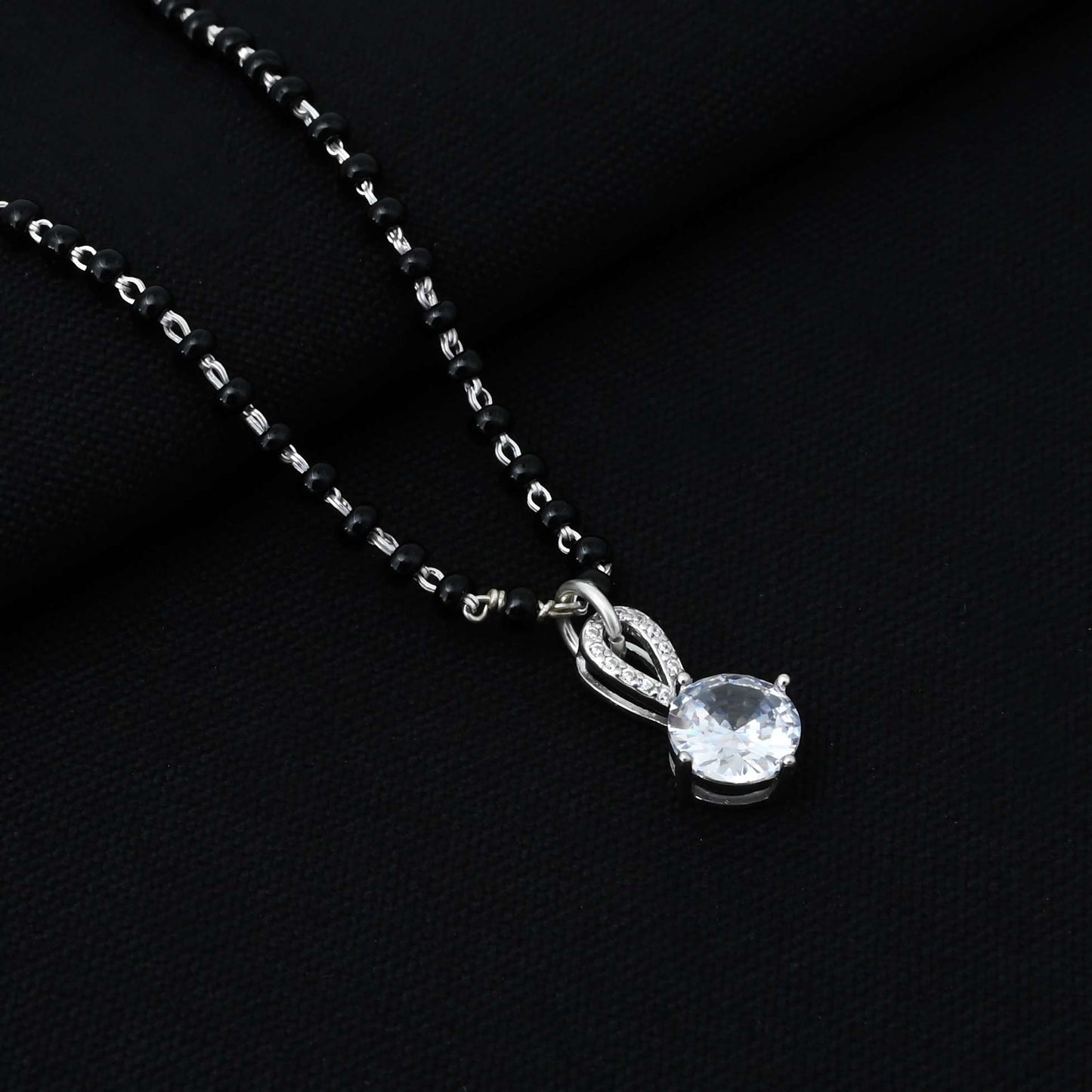 Charming sterling silver pendant showcasing a mystical magic theme with a sparkling round cut CZ