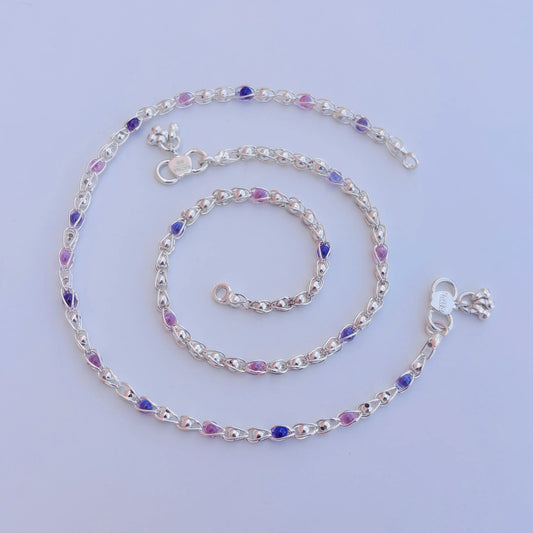 Elegant silver payal featuring a stylish chain design with multiple beads for added charm