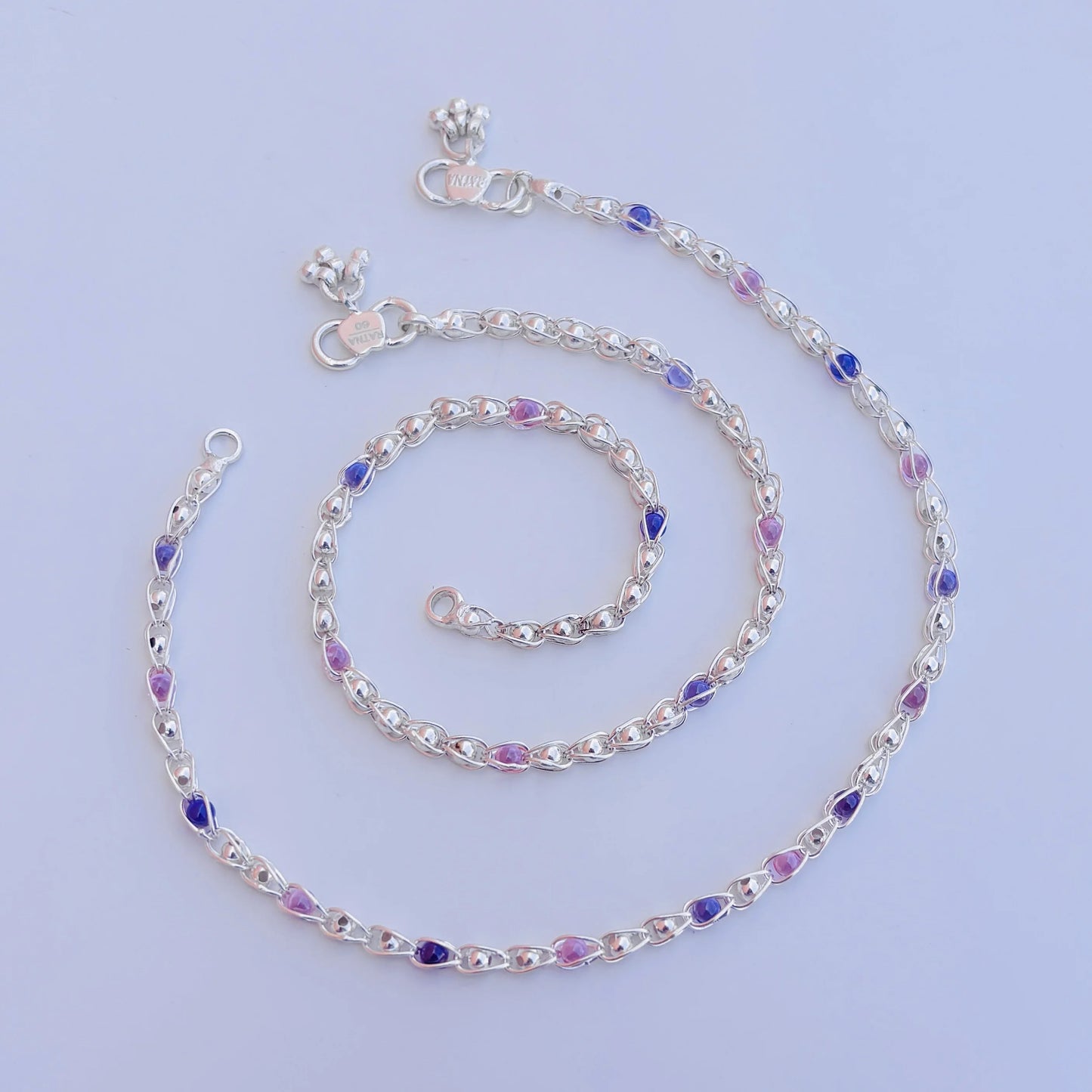 Fashionable silver payal with a chain design and multiple beads for a unique and trendy style