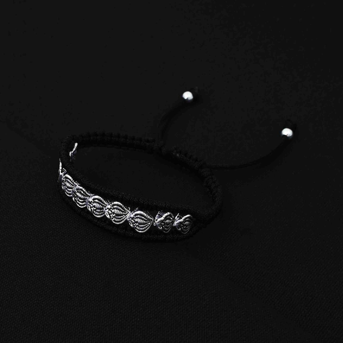 Trendy silver bracelet for boys with multiple sea shell motifs for a beach-inspired design