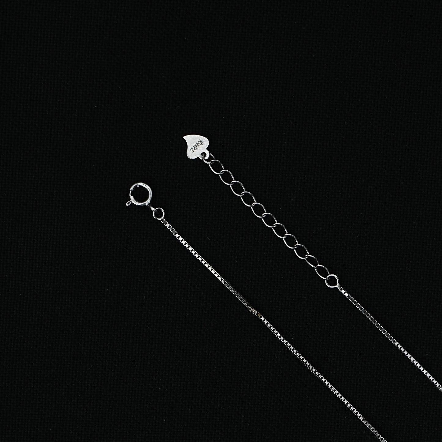 Chic sterling silver chain adorned with an 'N' letter pendant