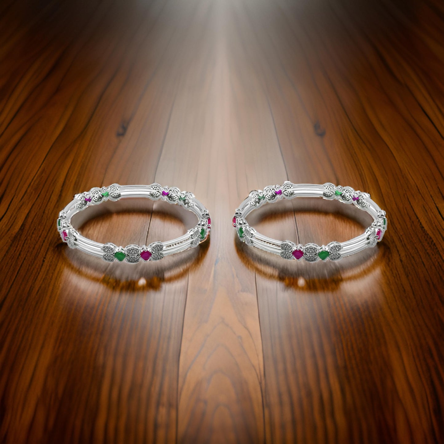 Elegant silver bangle set with carefully chosen gemstones, offering a refined and timeless accessory.