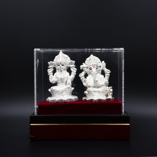 Handcrafted Lakshmi and Ganesha statue, symbolizing wealth, happiness, and good fortune for your home or temple.