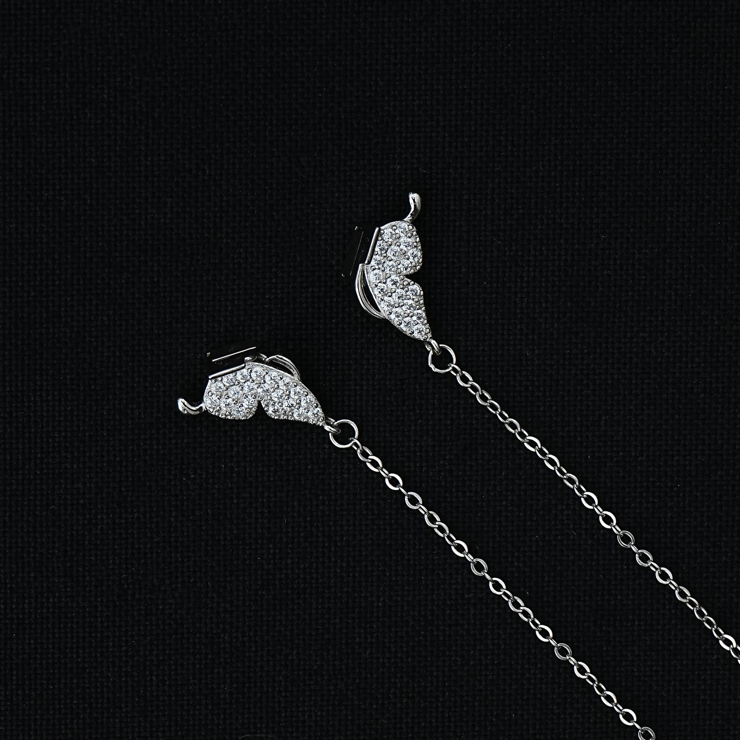 Chic sterling silver thin chain pendant with a butterfly motif.