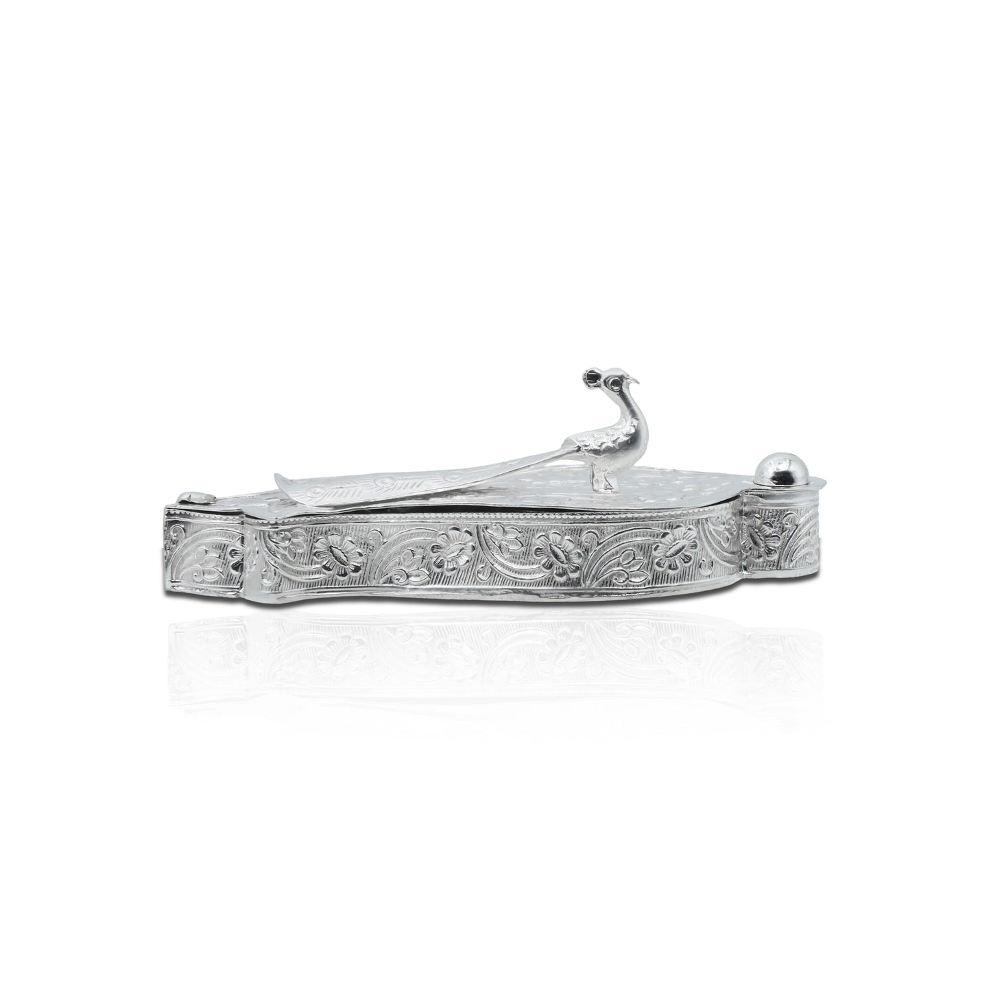 Handcrafted silver Sindoor box featuring a detailed peacock motif