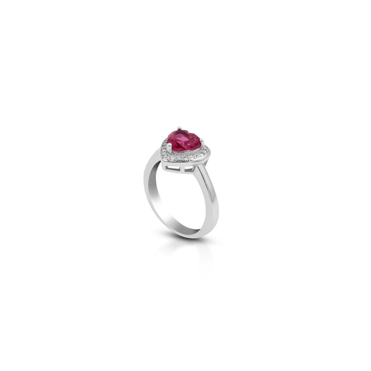 Sterling silver ring with heart-shaped pink gemstone.