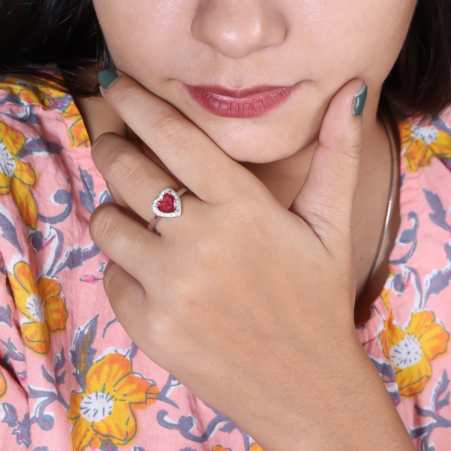 Pink gemstone heart design ring in sterling silver.