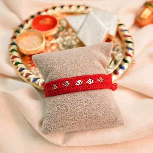 Silver Rakhi with Om Charm