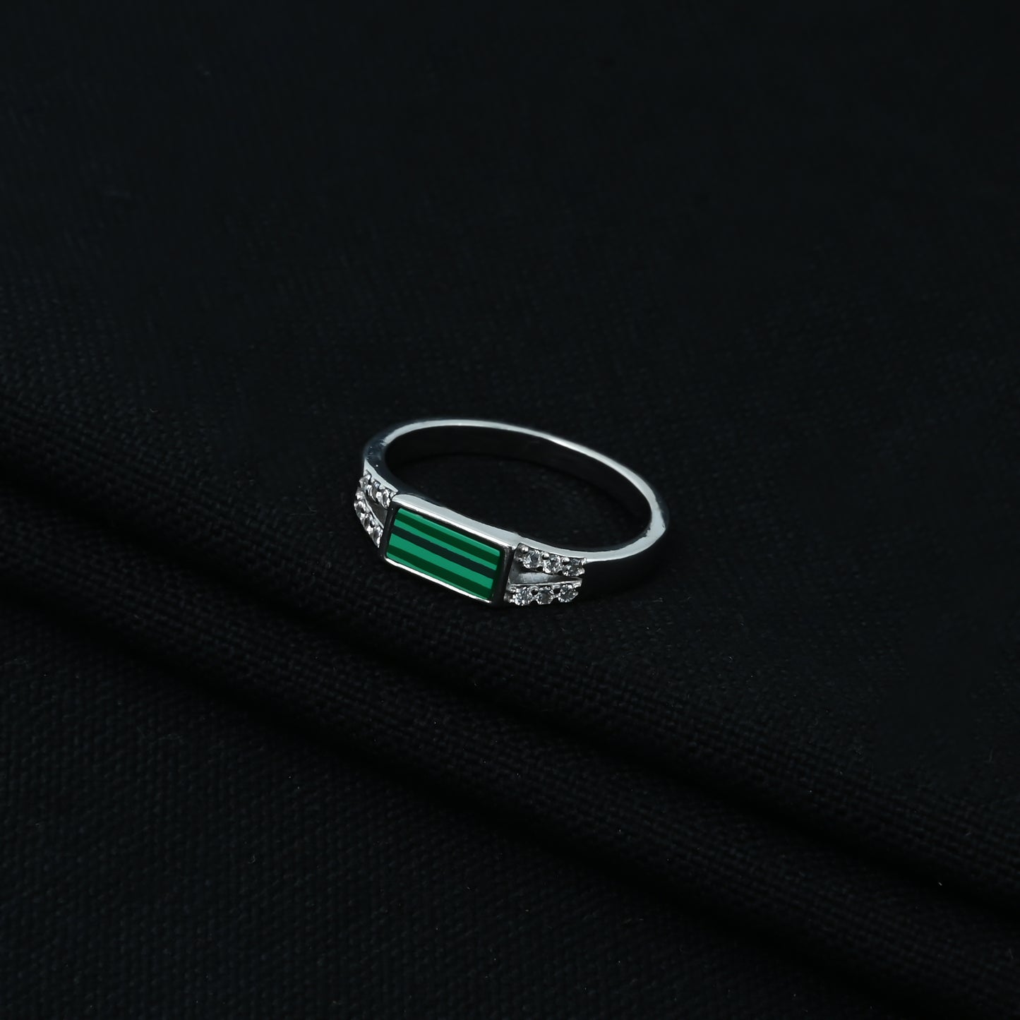 Stylish silver ring adorned with vibrant green malachite for girls