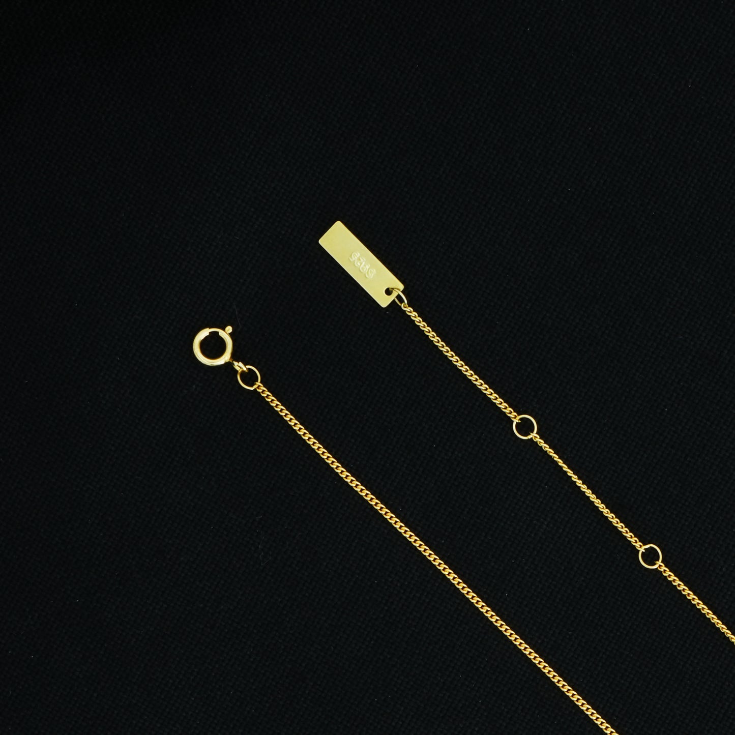 Minimalist circle pendant on a gold plated sterling silver chain