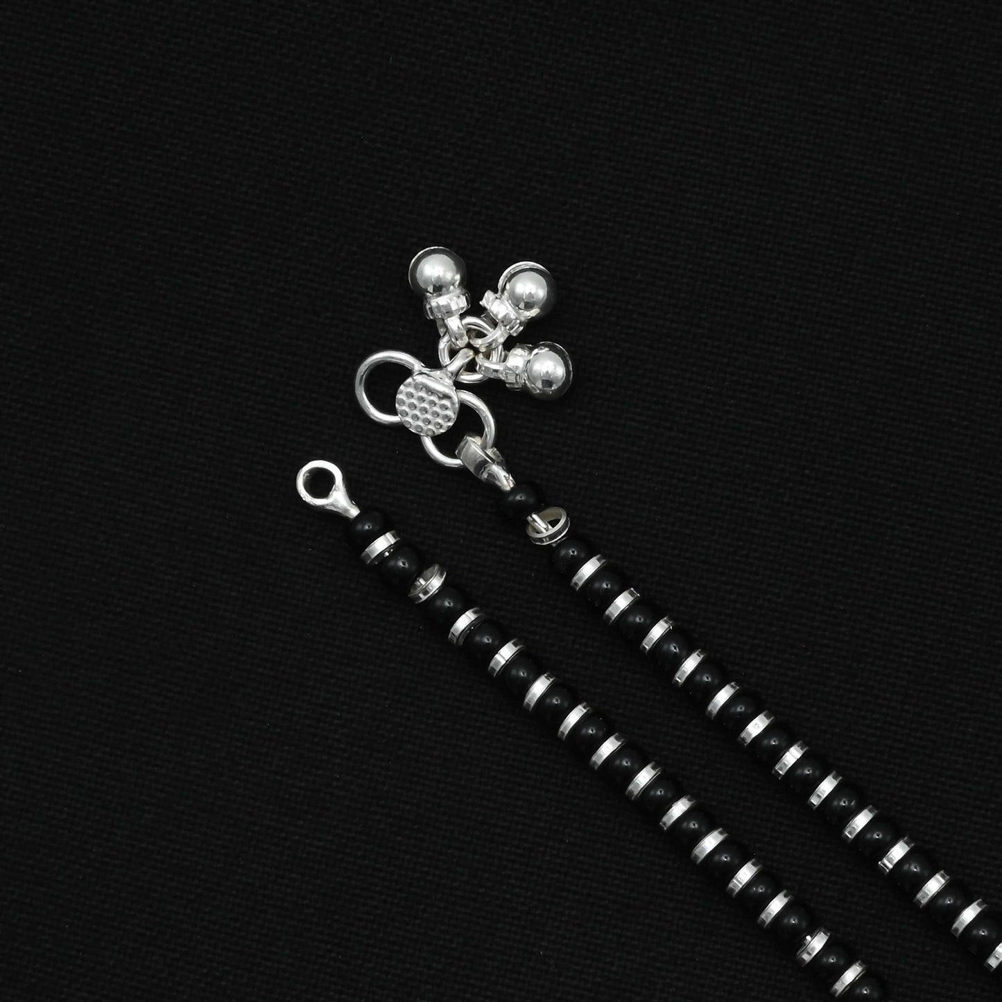 Girls' silver payal with delicate silver rings and medium ghungroo, adding a traditional touch