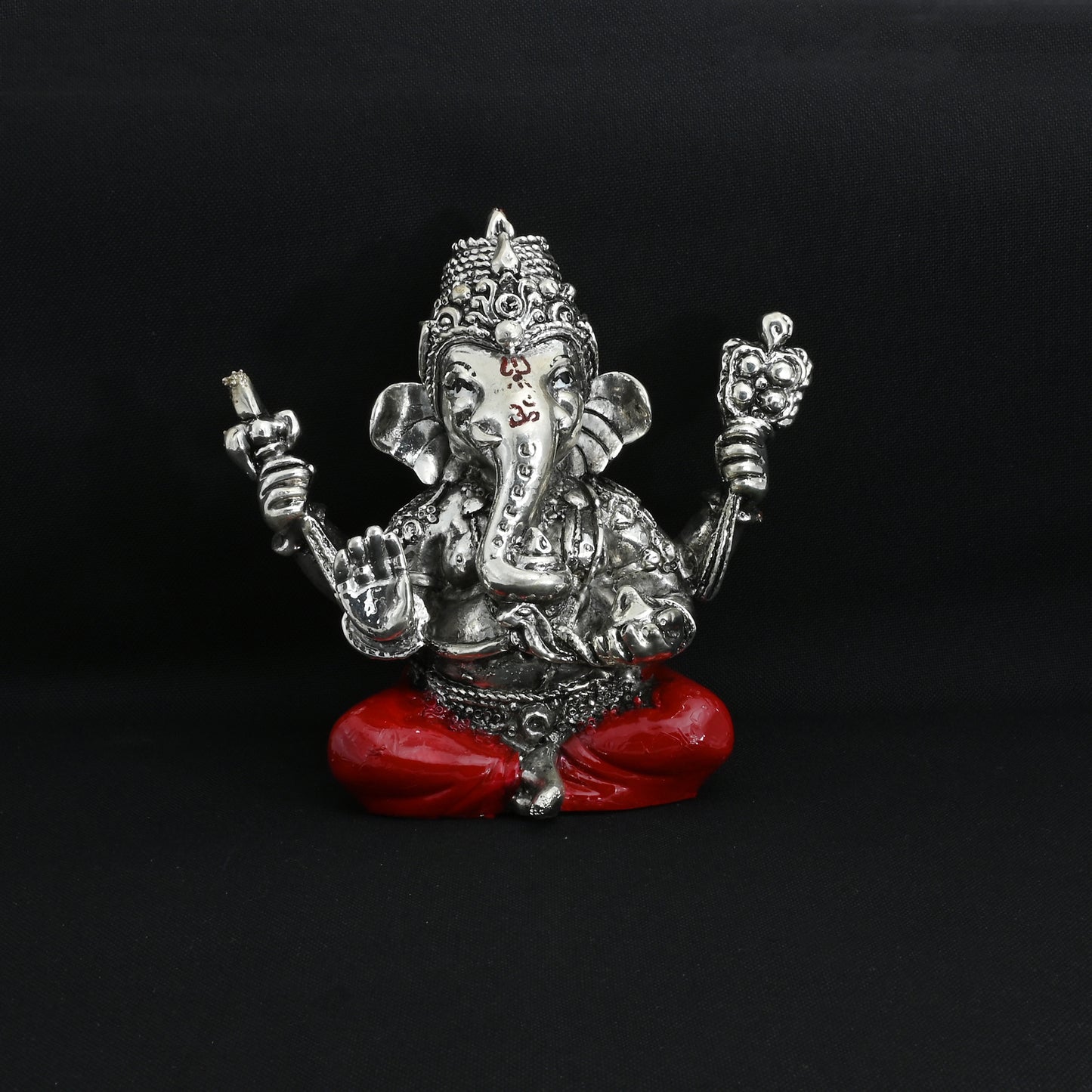 Premium silver Lord Ganesha statue in a blessing posture, designed to enhance your home with divine grace