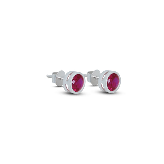 Stunning sterling silver earrings featuring round pink gemstones