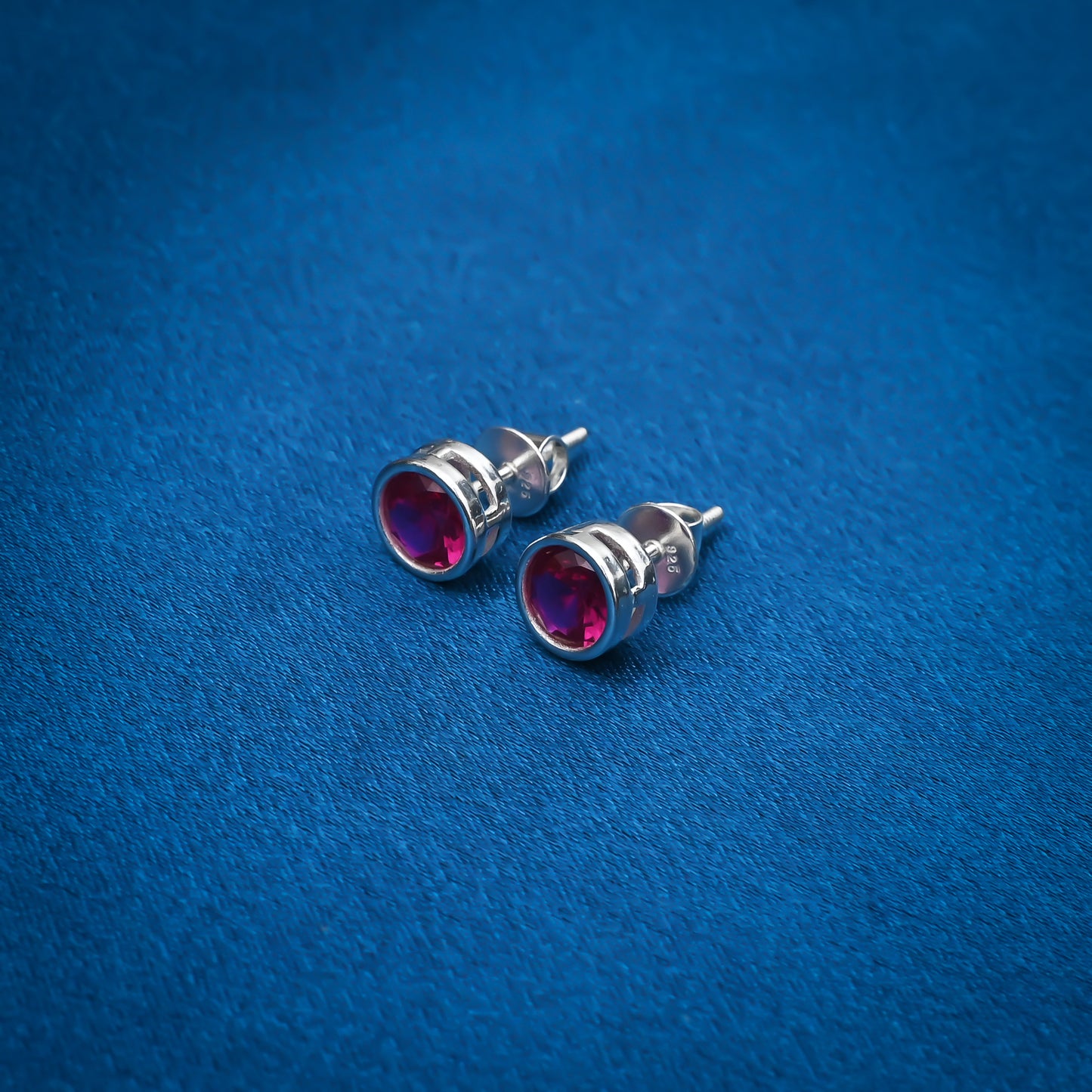 Beautiful round pink stone earrings set in sterling silver