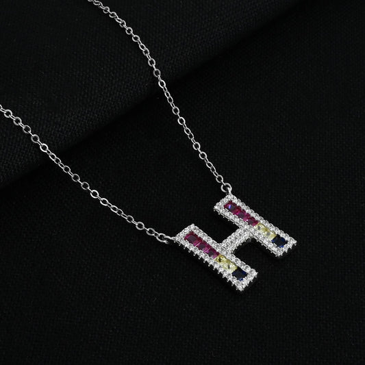 Elegant silver chain featuring a personalized 'H' pendant.