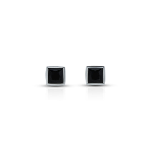 Minimalist sterling silver stud earrings featuring a sleek square black stone