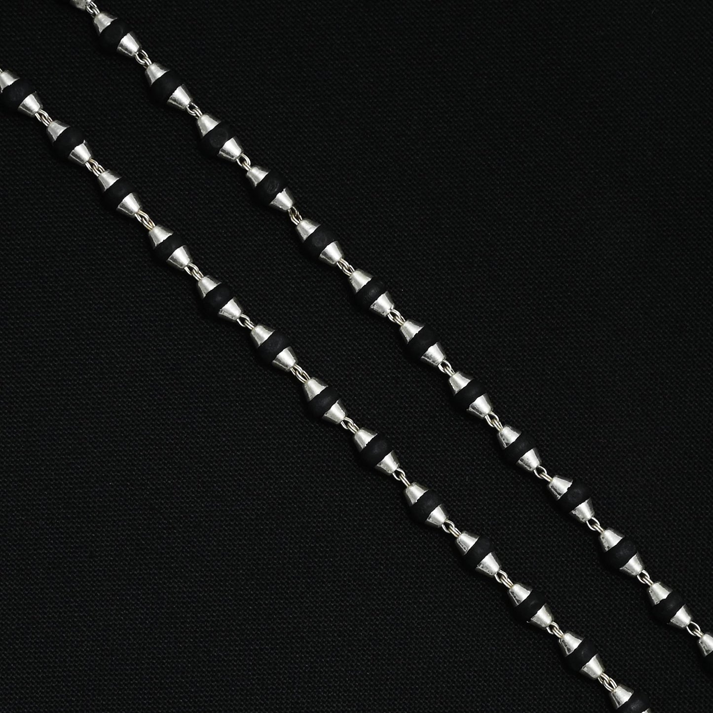 Engraved silver Tulsi mala, crafted for devotion and positive energy in your spiritual journey.